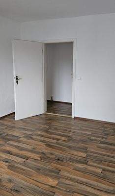 Empty Room with Open Door