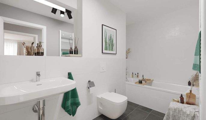 Ein modern gefliestes Badezimmer mit Wanne