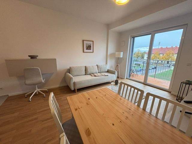 Erstbezug nach Sanierung - Vollmöblierte 2-Zimmer mit Parkett, Balkon, EBK, Fußbodenh. u. Belüftungsanlage - Photo 3