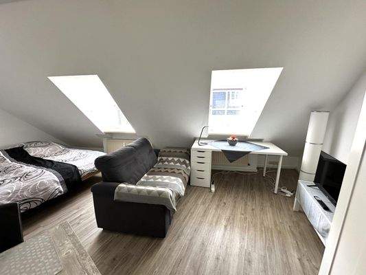 Lichtdurchflutetes Dachgeschoss-Apartment (2.OG) App.1