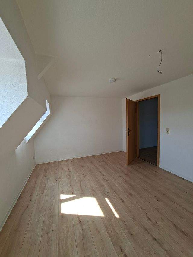 Helle 2-Raum-Dachgeschosswohnung mit großzügigem Wohnbereich - Foto 5