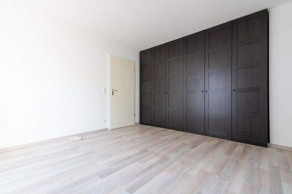 Schlafzimmer mit Einbauschrank