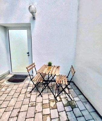 Eingang und Hinterhof