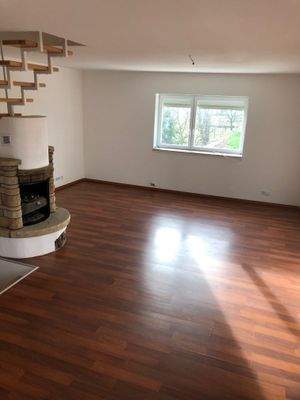 Wohnzimmer mit Kamin