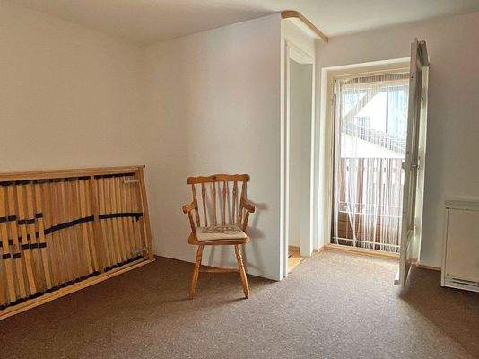 Wohn-/Essbereich mit Zugang zum Balkon