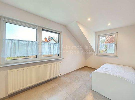 Zimmer OG li - Kinderzimmer, Leer (unmöbliert) - (KI generiert)