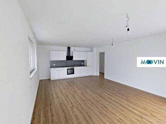 Ansicht IV: Wohnzimmer mit offenem Küchenbereich