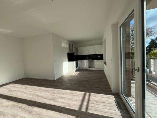 Zimmer mit offener Küche