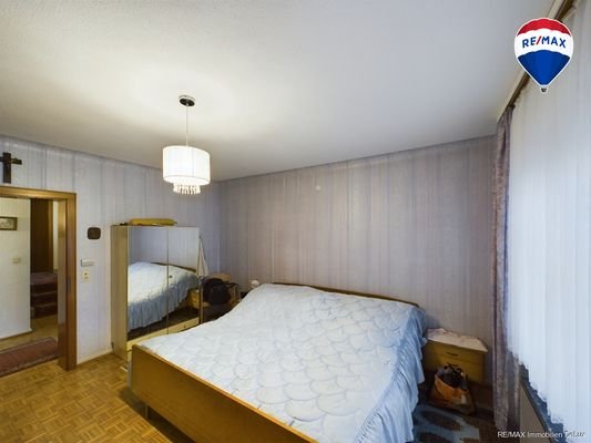 RE/MAX Immobilien DeLux Schlafzimmer EG