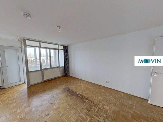 Ansicht I: Wohn- und Esszimmer mit Zugang zum Wintergarten