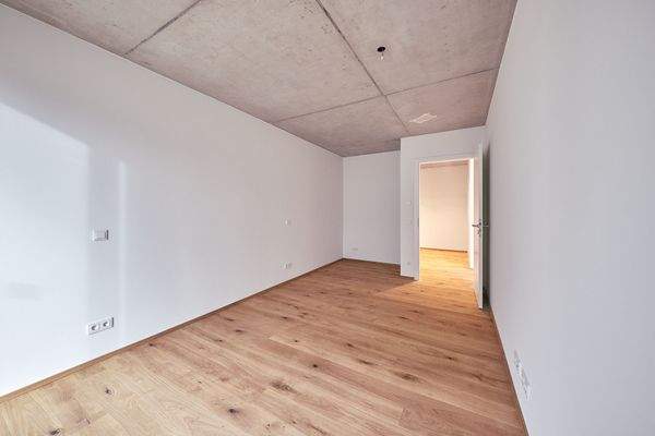 Schlafzimmer mit Blick zum Flur - HERDERGÄRTEN 3.0.4