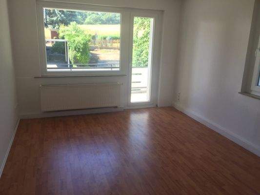 Wohnzimmer mit Balkon