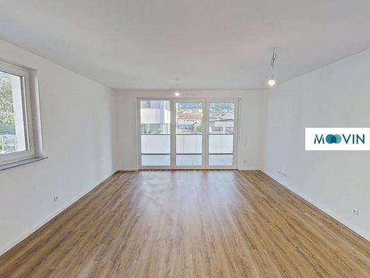 Ansicht II: Wohn- und Esszimmer mit offenem Küchenbereich