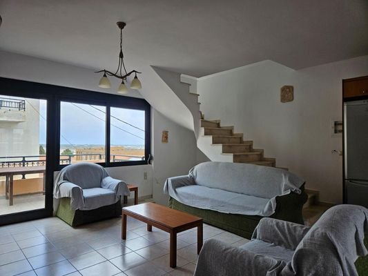 Kreta, Koutouloufari: Haus im Dorfzentrum mit großer Dachterrasse mit herrlichem Blick auf Hersonissos und das Meer zu verkaufen