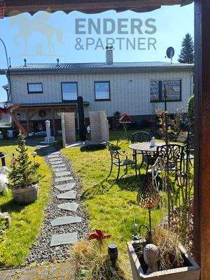 Hausrückseite mit gemauerter Solardusche