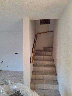 Treppenaufgang ins Obergeschoss