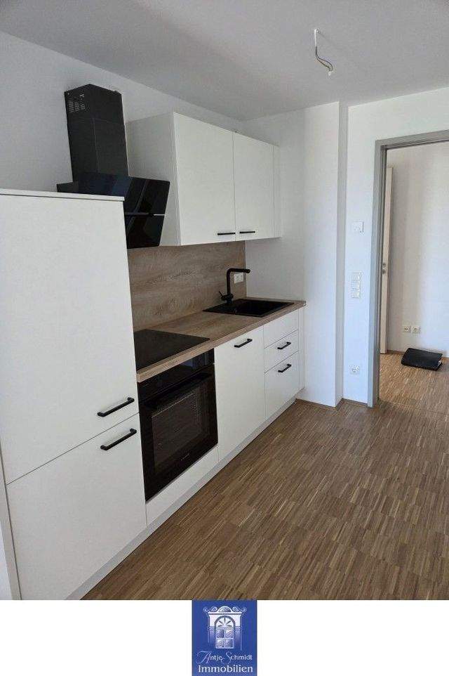 Erstbezug! Traumwohnung im Neubau, Fußbodenheizung, großer Balkon, EBK, Lift! - Photo 1