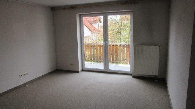 Wohnzimmer mit Balkon