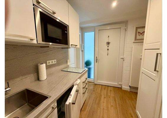 Eingangsbereich mit offener Küche Ansicht (2)