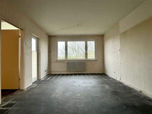 Wohnzimmer mit Balkon