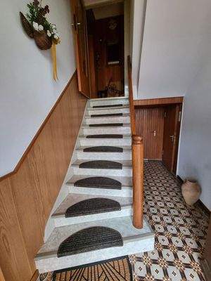 Treppe zum 1. Obergeschoss