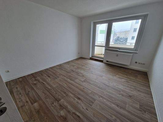 Wohnzimmer mit Balkon