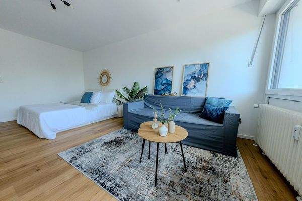 Wohnbereich mit Bett