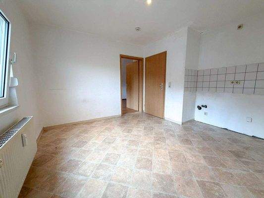 Wohnzimmer mit Küche