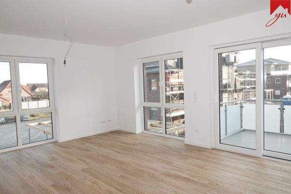 Wohn- und Essbereich mir Zugang zum Balkon