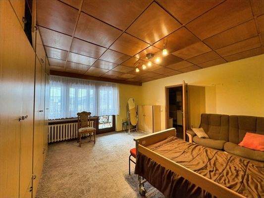 Schlafzimmer mit Balkonzugang