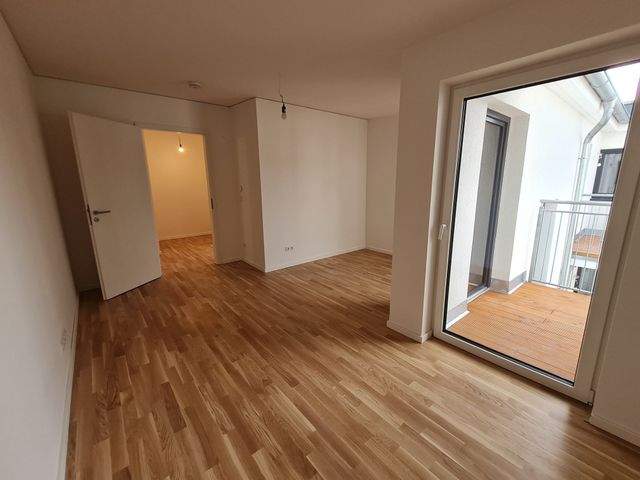 Schicke 4- Zimmerwohnung mit Parkett, Einbauküche, Balkon u. guter Energieeffizienz - Foto 5