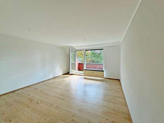 Wohnbereich mit Zugang zur Loggia