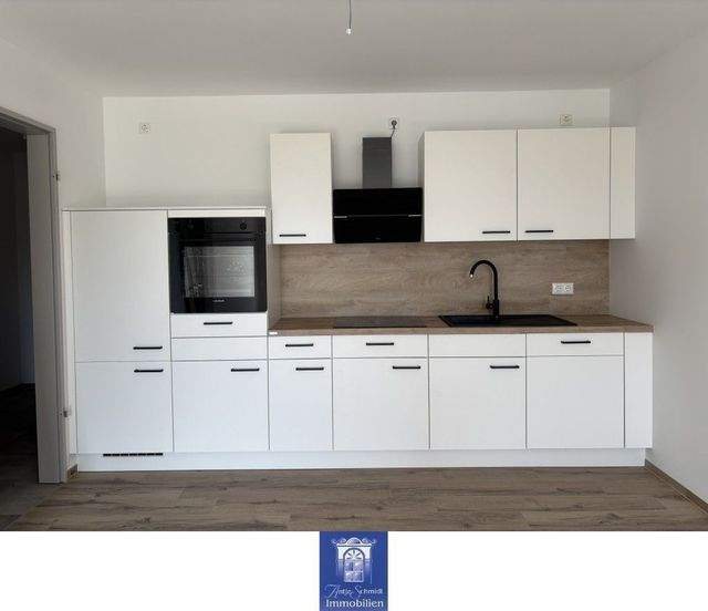 Wohlfühlwohnung mit Terrasse und moderner Ausstattung im Erstbezug! Rollstuhlgerecht! - Foto 2