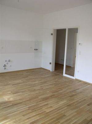 Wohnzimmer mit Küchenbereich.JPG