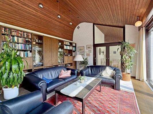 Wohnzimmer und Zugang zum Wintergarten