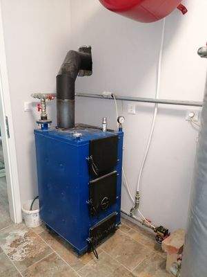  Kesselraum / Holzkessel