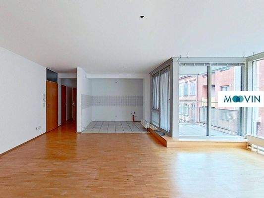 Ansicht III: Wohn- und Esszimmer mit offenem Küchenbereich