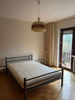 Schlafzimmer mit Balkon