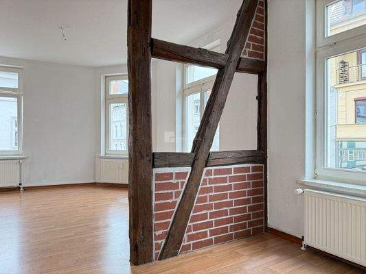 Das Wohnzimmer mit Arbeitsecke oder Gästenische