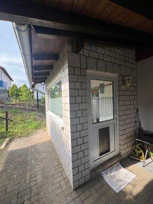 Hintereingang mit Windfang