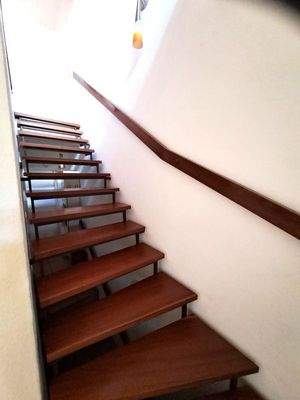 Holztreppe ins OG