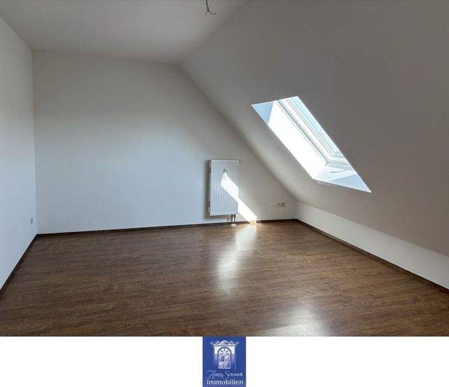 Gemütliche Dachgeschoss-Maisonette-Wohnung in zentraler Lage! - Photo 3
