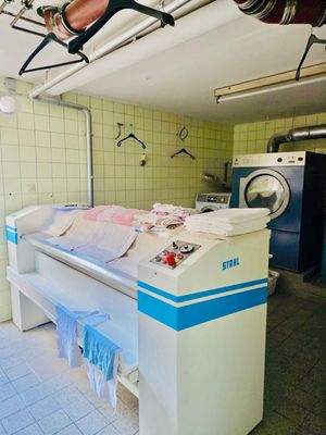 Apartmenthaus - Wäscherei