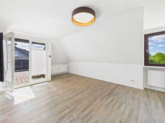 Wohnzimmer mit Ausgang Dachterrasse