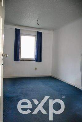 Zimmer 2 unrenoviert 1.  OG