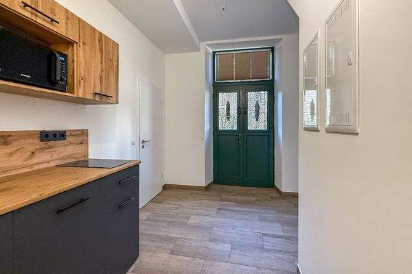 Küche/Zugang in den Innenhof