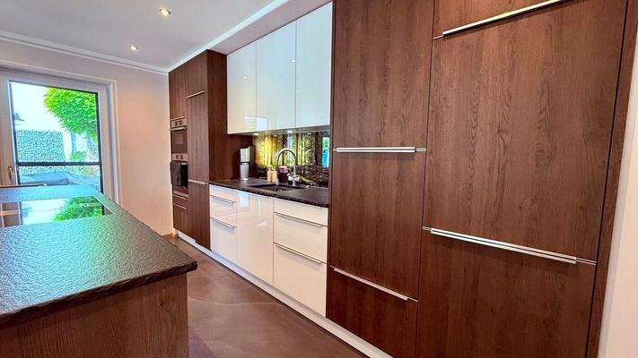 Induktionskochfeld mit integriertem Dunstabzug