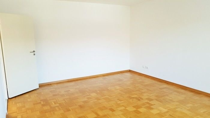 Wohnzimmer mit Parkett