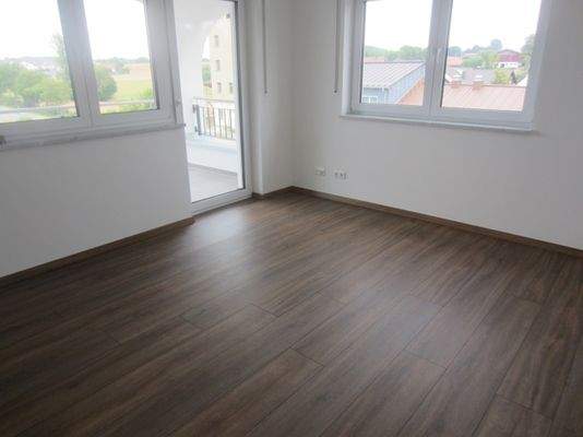 Wohnzimmer mit Balkon