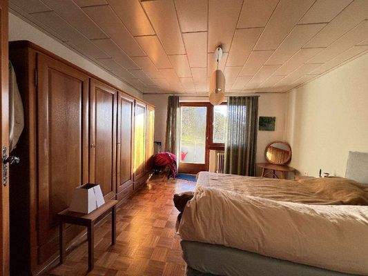 Schlafzimmer mit Balkonzugang